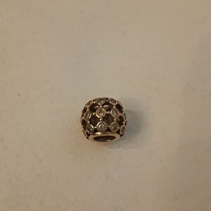 Pandora 14K solid gold "In the spotlight " charm with CZ